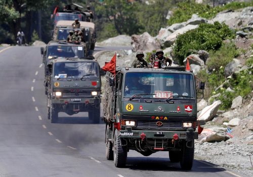 An Indian Army convoy moves along a highway leading to Ladakh, at Gagangeer in Kashmir’s Ganderbal district, June 18, 2020.