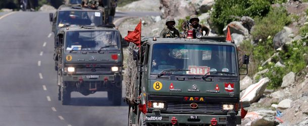 An Indian Army convoy moves along a highway leading to Ladakh, at Gagangeer in Kashmir’s Ganderbal district, June 18, 2020.