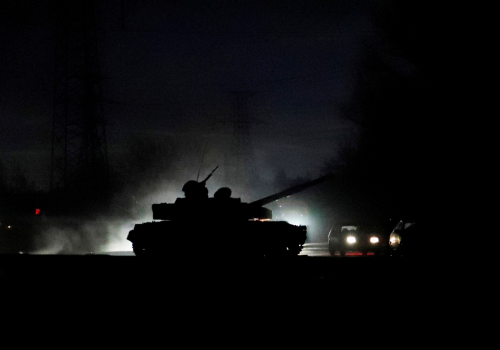 A tank drives along a street in the separatist-controlled city of Donetsk, Ukraine, February 22, 2022.