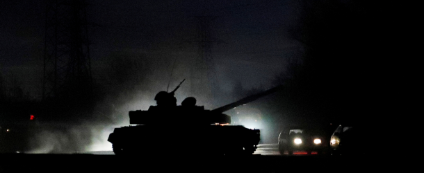 A tank drives along a street in the separatist-controlled city of Donetsk, Ukraine, February 22, 2022.