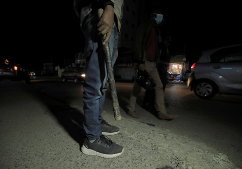 Vigilantes armed with clubs stand guard at a neighborhood in Bole following the Ethiopian Prime Minister Abiy Ahmed’s call for citizens to protect their areas from the Tigray People’s Liberation Front (TPLF), November 19, 2021.