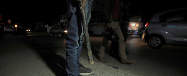 Vigilantes armed with clubs stand guard at a neighborhood in Bole following the Ethiopian Prime Minister Abiy Ahmed’s call for citizens to protect their areas from the Tigray People’s Liberation Front (TPLF), November 19, 2021.