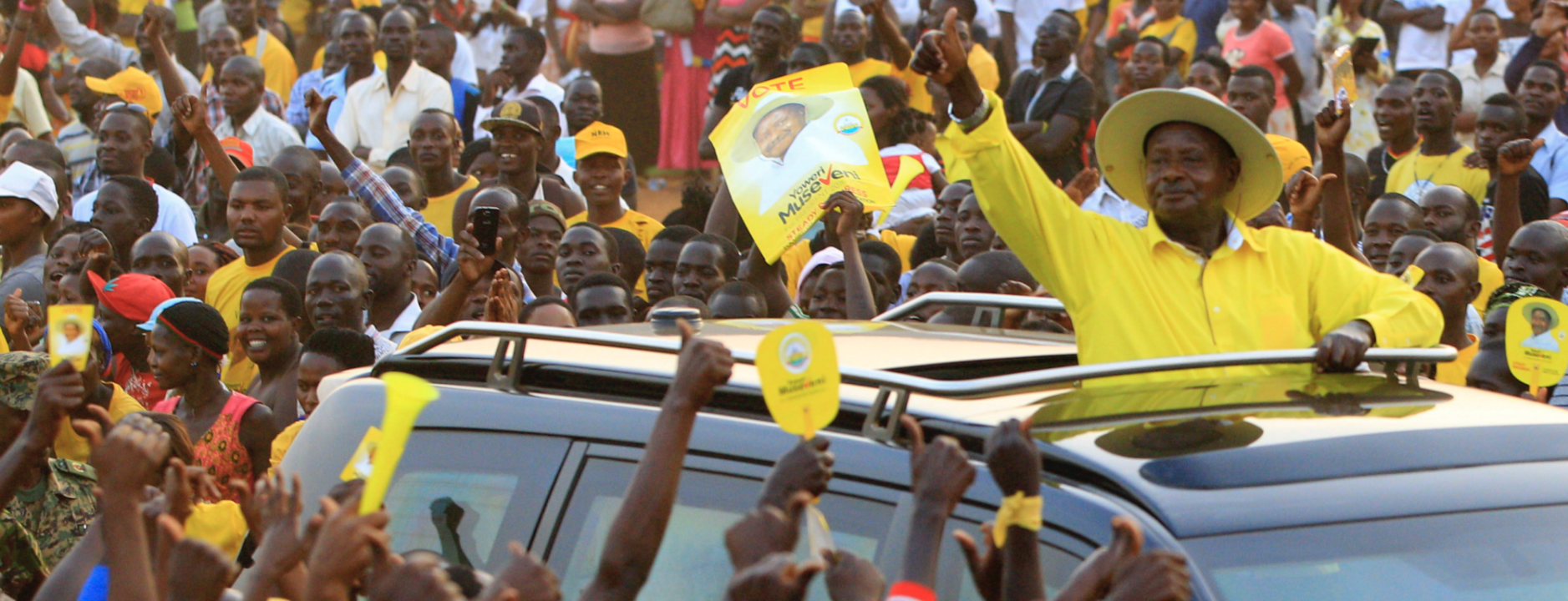In this photo from the 2016 Ugandan presidential election, Uganda’s President and the presidential candidate Yoweri Museveni of the ruling party National Resistance Movement (NRM) waves to his supporters as he arrives at a campaign rally in Entebbe, Uganda, February 10, 2016. 
