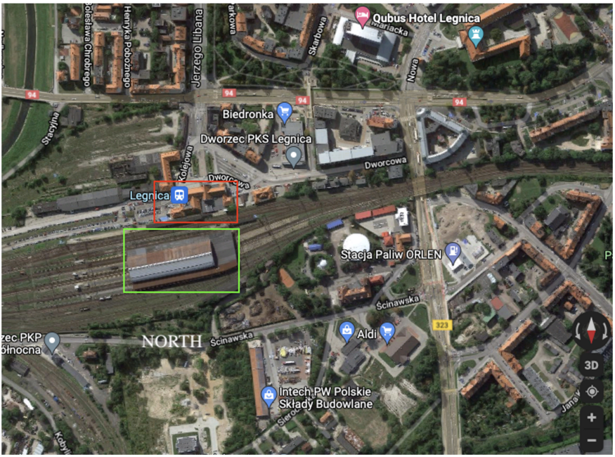 South-north orientation of Google Map highlighting the main station building (red box), the platform (green box), and the absence of a building north of the platform building with a similar shape to the main station building. Note that the image is reversed to standard compass rose directions, with north at the bottom and south at the top. 