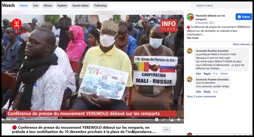 A screengrab from a video of an event organized by Yerewolo and posted to its Facebook page on December 8, 2021, showing GPM placards held up by attendees. 