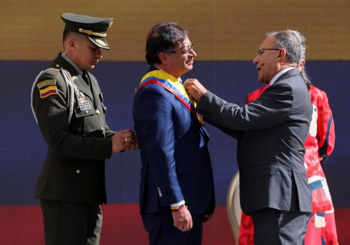 Gustavo Petro receives the presidential sash during his swearing-in ceremony in Bogota, August 7, 2022. Petro was among several candidates targeted by so-called “disinformation for hire” campaigns. (Source: REUTERS/Luisa Gonzalez)