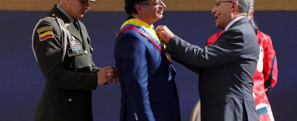 Gustavo Petro receives the presidential sash during his swearing-in ceremony in Bogota, August 7, 2022. Petro was among several candidates targeted by so-called “disinformation for hire” campaigns. (Source: REUTERS/Luisa Gonzalez)