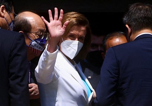 US House Speaker Nancy Pelosi waves while leaving the parliament in Taipei, Taiwan, August 3, 2022.
