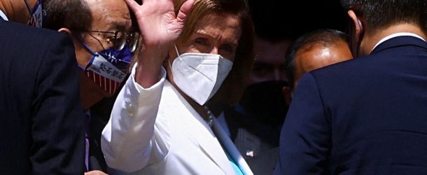 US House Speaker Nancy Pelosi waves while leaving the parliament in Taipei, Taiwan, August 3, 2022.