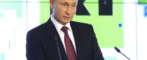 Vladimir Putin addresses RT staff in Moscow at an event celebrating the tenth anniversary of the network, December 10, 2015.