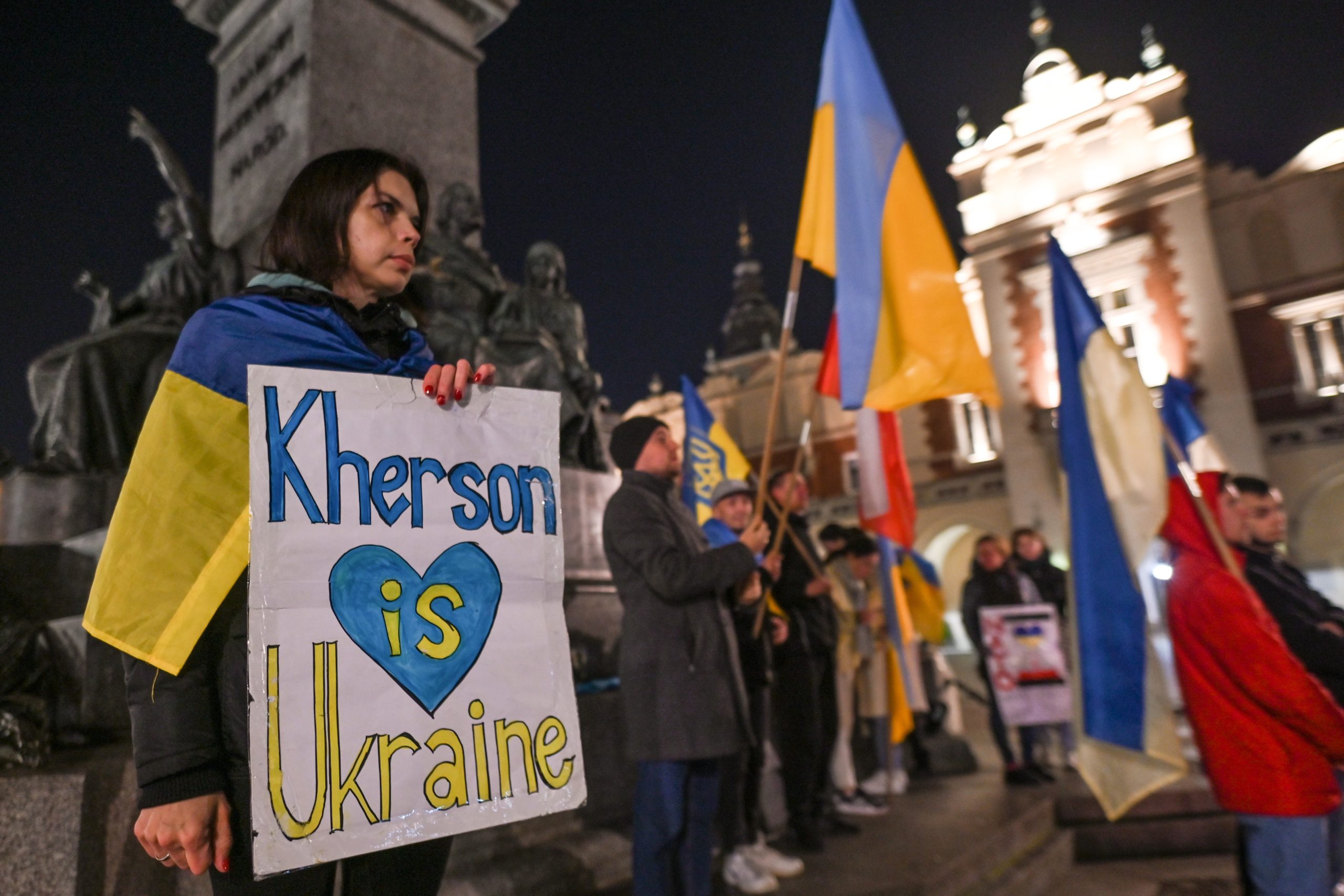 Ukrainians people living in Krakow and their supporters are seen during the Solidarity With Ukraine protest in Krakow's Main Square, on the 232nd day of the Russian invasion of Ukraine.