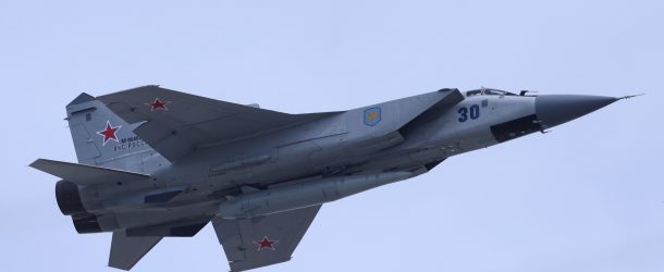 BANNER: A Russian MiG-31 fighter jet equipped with a Kinzhal hypersonic missile flies over Moscow's Red Square during a rehearsal for a flyover, part of an annual military parade marking the anniversary of the victory over Nazi Germany, May 7, 2022. (Source: Reuters/Maxim Shemetov)