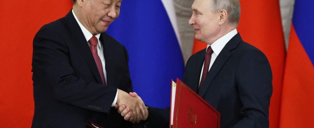 Russian President Vladimir Putin shakes hands with Chinese President Xi Jinping during a signing ceremony following their talks at the Kremlin in Moscow, Russia March 21, 2023. Sputnik/Mikhail Tereshchenko/Pool via REUTERS