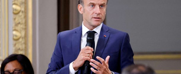 FILE PHOTO: France's President Emmanuel Macron addresses mayors of cities affected by the violent clashes that erupted after a teen was shot dead by police last week, during a meeting at the presidential Elysee Palace in Paris, France on July 4, 2023. LUDOVIC MARIN/Pool via REUTERS//File Photo