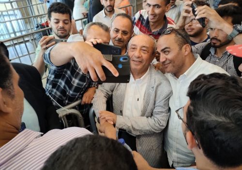 Tarek el-Nabarawy poses with supporters ahead of the Egyptian Engineers Syndicate vote, May 30, 2023.