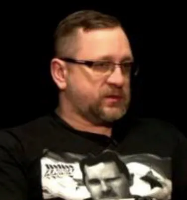 Portrait of Kotenok in Assad T-shirt from rusprav.tv.