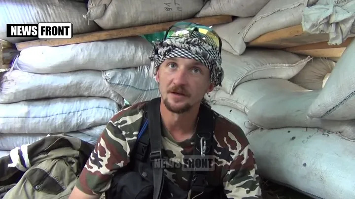 Screen capture from an interview with a pro-separatist news site, where a separatist fighter tells how he and other fighters fought in Maryinka on 3 June 2015. 