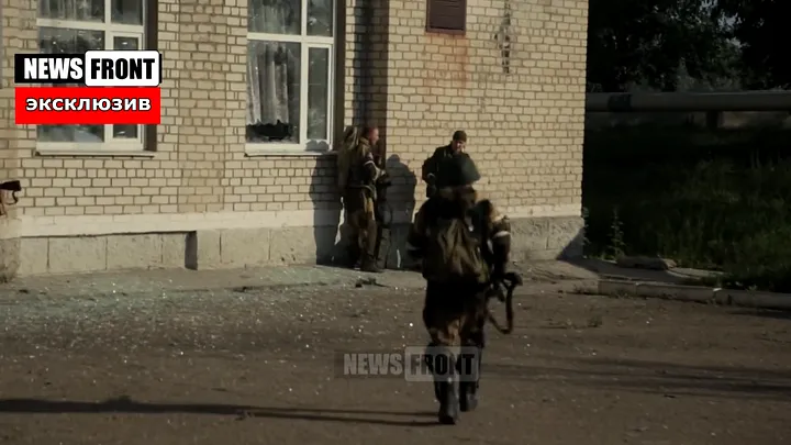 Screen capture from a pro-separatist video showing a battle in Maryinka in the morning of June 3, 2015. The camera is facing north, with shadows being cast to the west. 
