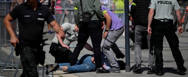 A person is detained after Slovakia's Prime Minister Robert Fico was shot at close range in an assassination attempt, after a government meeting in Handlova, Slovakia, May 15, 2024. Source: REUTERS/Radovan Stoklasa/File Photo)