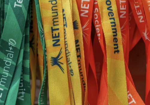 BANNER: Lanyards on display at the NetMundial+10 conference in São Paulo, Brazil. (Source: netmundial10)